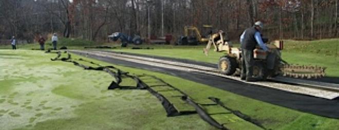 Golf green trenching